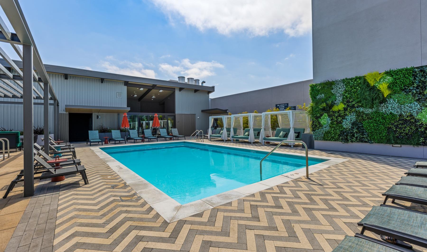 Sparkling swimming pool a swimming pool outside a building