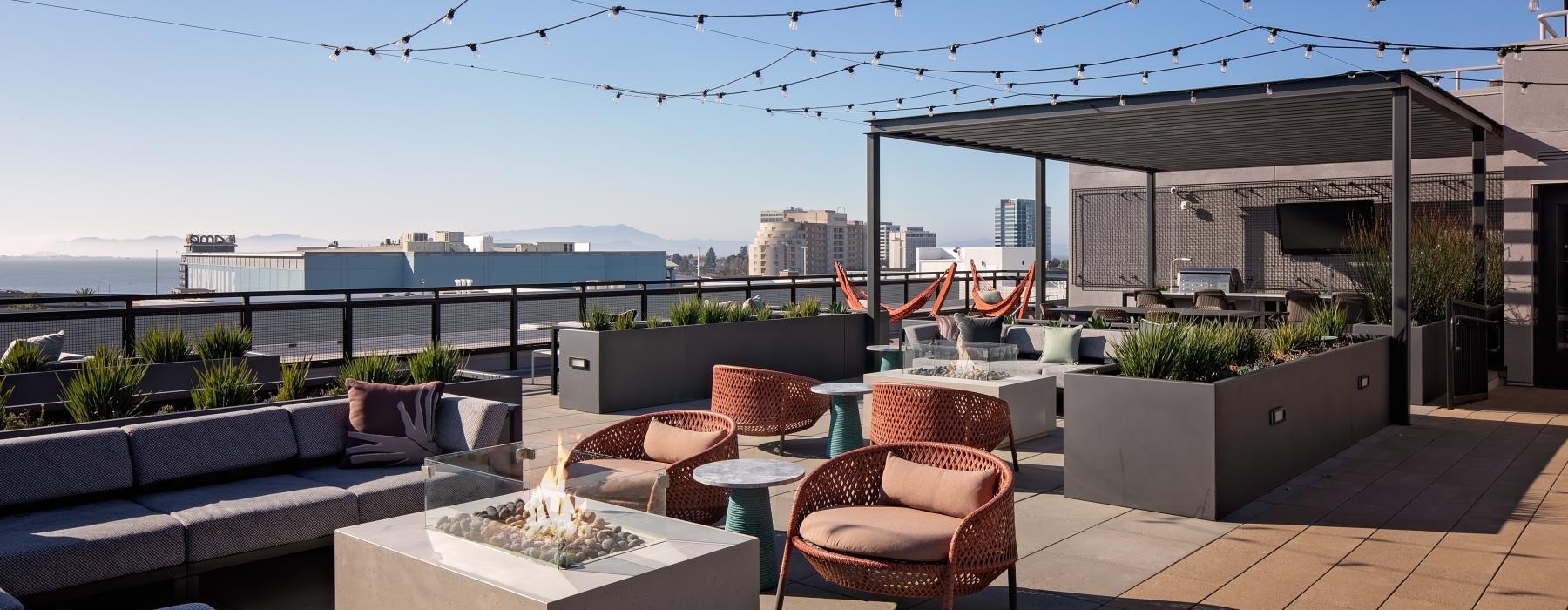 a patio with chairs and tables