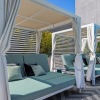 a lounge chair and a table